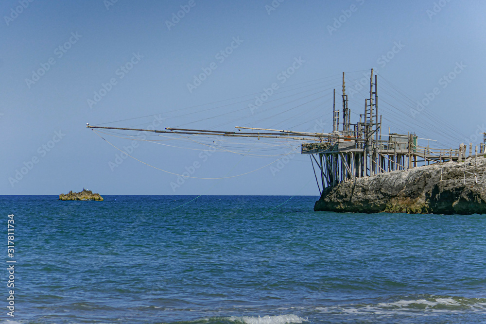 Trabucco Ancient Fishing Structure Platform Vieste Apulia Gargano Peninsula Puglia, Italy Trabucco Ancient Fishing Structure Platform Vieste Apulia Gargano Peninsula Puglia, Italy