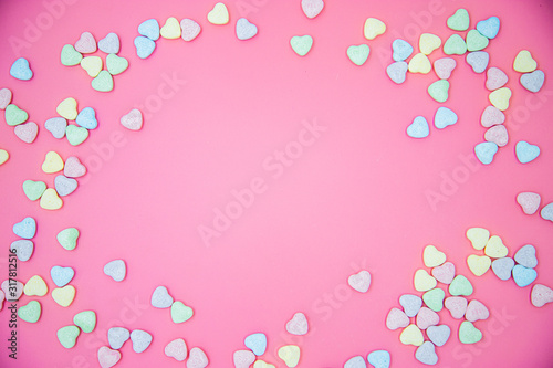 Heart shape message letter candy on pink background. Valentines day concept. 