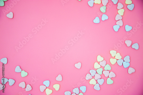 Heart shape message letter candy on pink background. Valentines day concept. 
