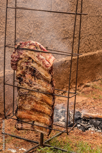Brazilian barbecue consisting of ground rib, roasted with fruit wood, culinary ingredients, selective focus