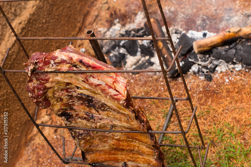 Brazilian barbecue consisting of ground rib, roasted with fruit wood, culinary ingredients, selective focus