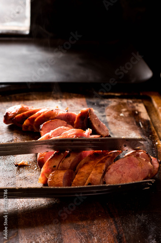 Brazilian barbecue consisting of ground rib, roasted with fruit wood, culinary ingredients, selective focus