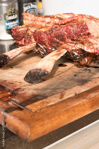 Brazilian barbecue consisting of ground rib, roasted with fruit wood, culinary ingredients, selective focus