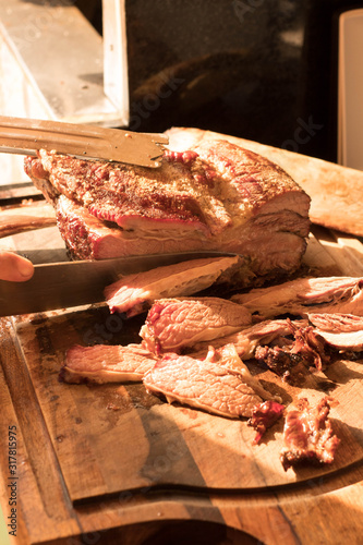 Brazilian barbecue consisting of ground rib, roasted with fruit wood, culinary ingredients, selective focus