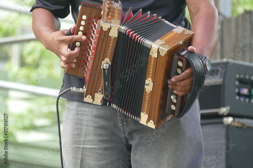Zydeco Accordian player  entertains the crowd