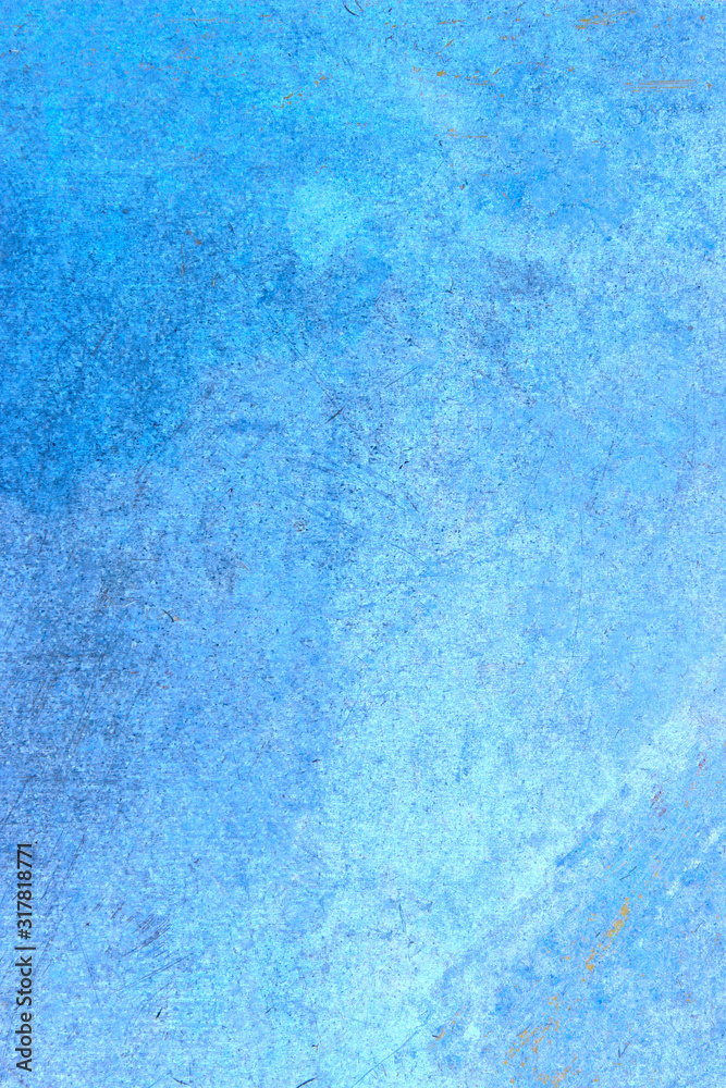 Vertical image of a blue concrete wall. Abstract blue wall texture background, copy space for text.