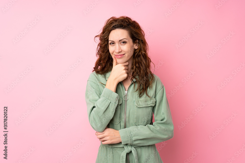 Young pretty woman over isolated pink background smiling Young pretty woman over isolated pink background smiling