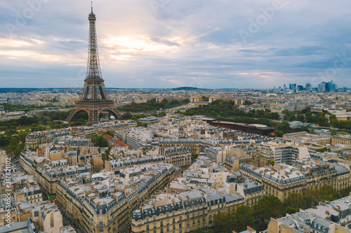 Aerial cityscape of Paris France with Eiffel Tower at sunset 