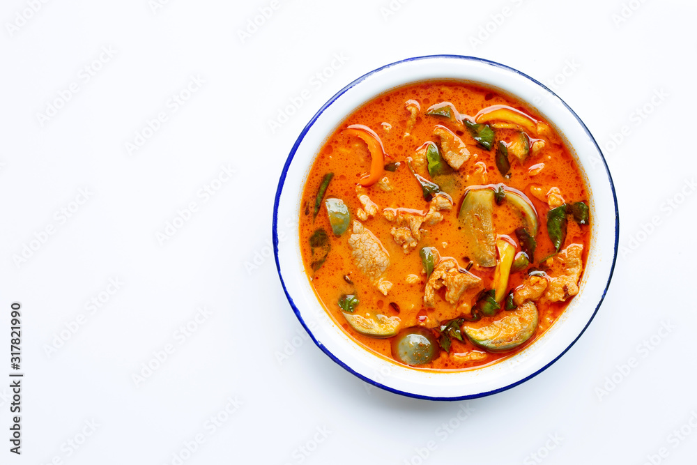 Fototapeta premium Red curry round eggplant with pork, white background.