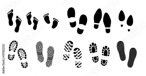 set of black human footprints or human shoe sole or funny footsteps paw. easy   to modify