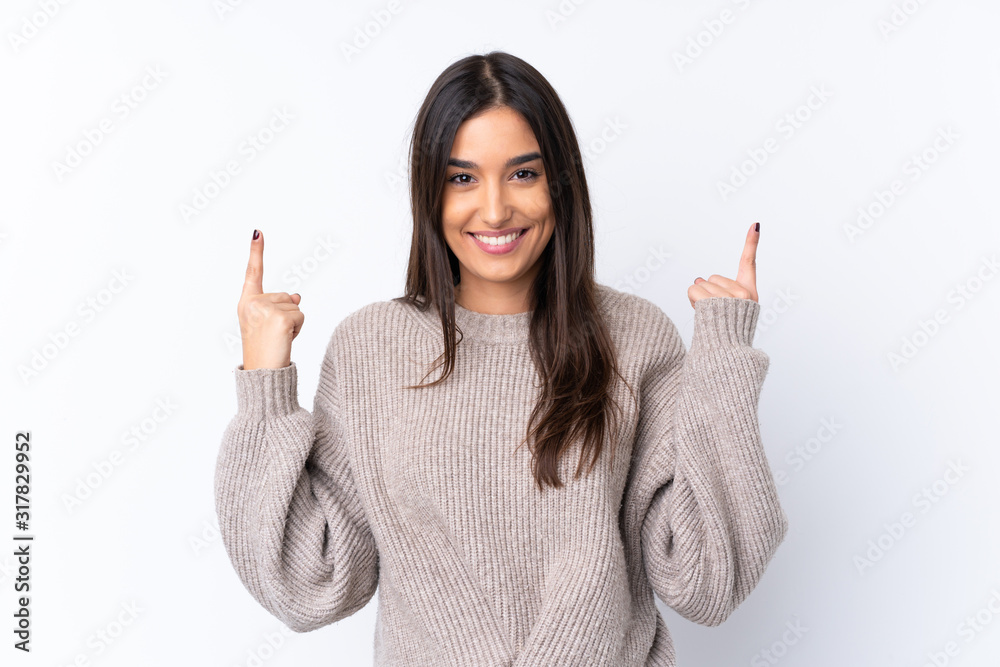 Young brunette woman over isolated white background pointing up a great idea Young brunette woman over isolated white background pointing up a great idea
