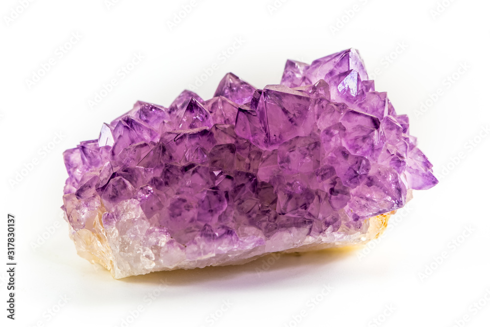 Amethyst stone druse cluster, isolated on white background. Natural, purple amethyst stone close-up. Amethyst stone is one of the most using healing crystals. Amethyst stone druse cluster, isolated on white background. Natural, purple amethyst stone close-up. Amethyst stone is one of the most using healing crystals.