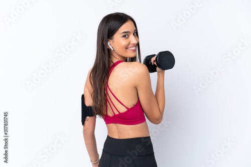 Young sport brunette woman over isolated white background making weightlifting