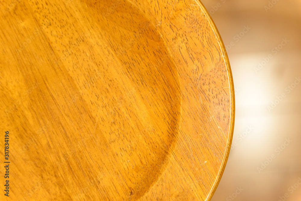 It is a simple wooden stool It is a simple wooden stool