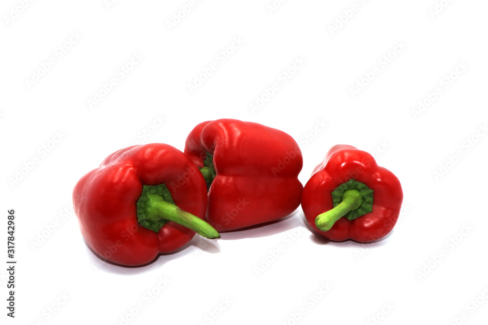 Sweet peppers, colorful vegetables placed on a white background