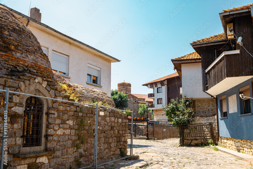 Ancient ruins and old town street in Nessebar, Bulgaria