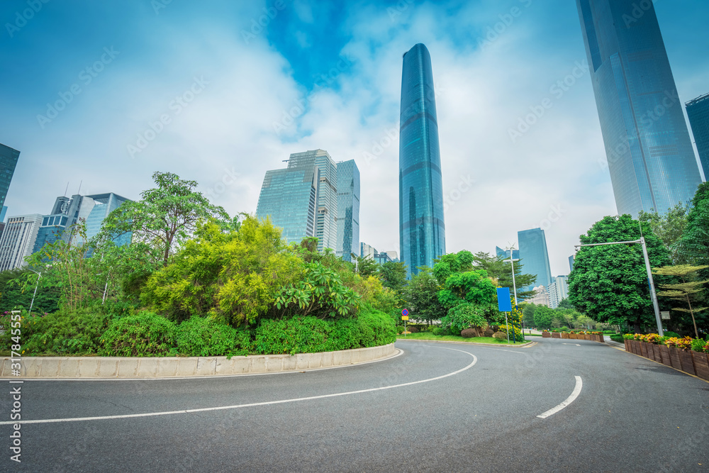 asphalt pavement with modern urban background ,guangzhou ,China