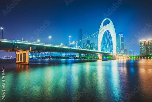 night skyline and modern cityscape in guangzhou at riverside