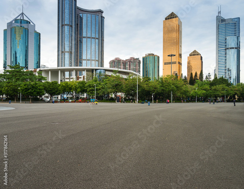 empty, modern square and skyscrapers in modern city