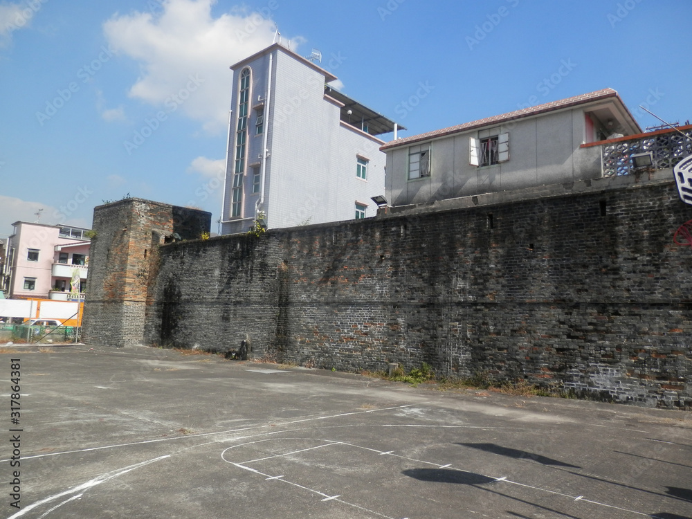 Parking area in front of ancient walled city Parking area in front of ancient walled city