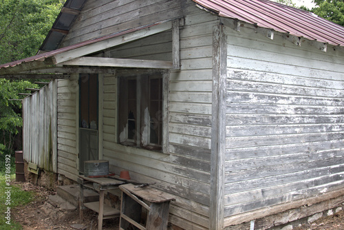 Rusty tin roof on an abandoned farm home