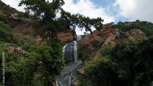 Crocodile river waterfall time lapse at the walter sisulu national botanical gardens in roodepoort, South Africa. Calm peaceful meditation scene and very relaxing photo