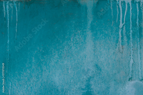 abstract grunge aqua blue metal surface texture. Drips of blue paint on grunge metal background