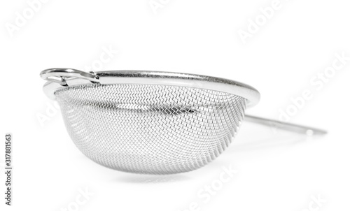 Tea strainer (small sieve) with handle. Isolated with clipping path. photo