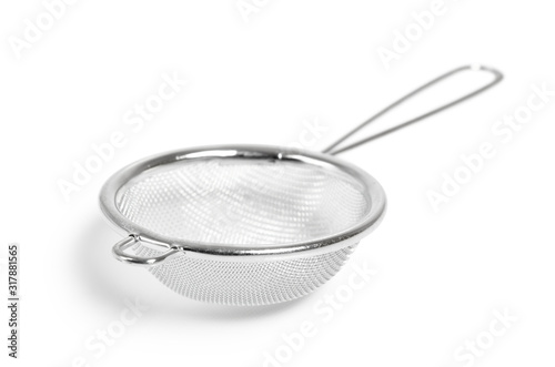 Tea strainer (small sieve) with handle. Isolated with clipping path. photo