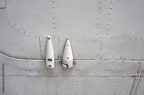 Foto Steel Round Head Rivets in sheet aluminium body and Security Hasp Latch Lock of