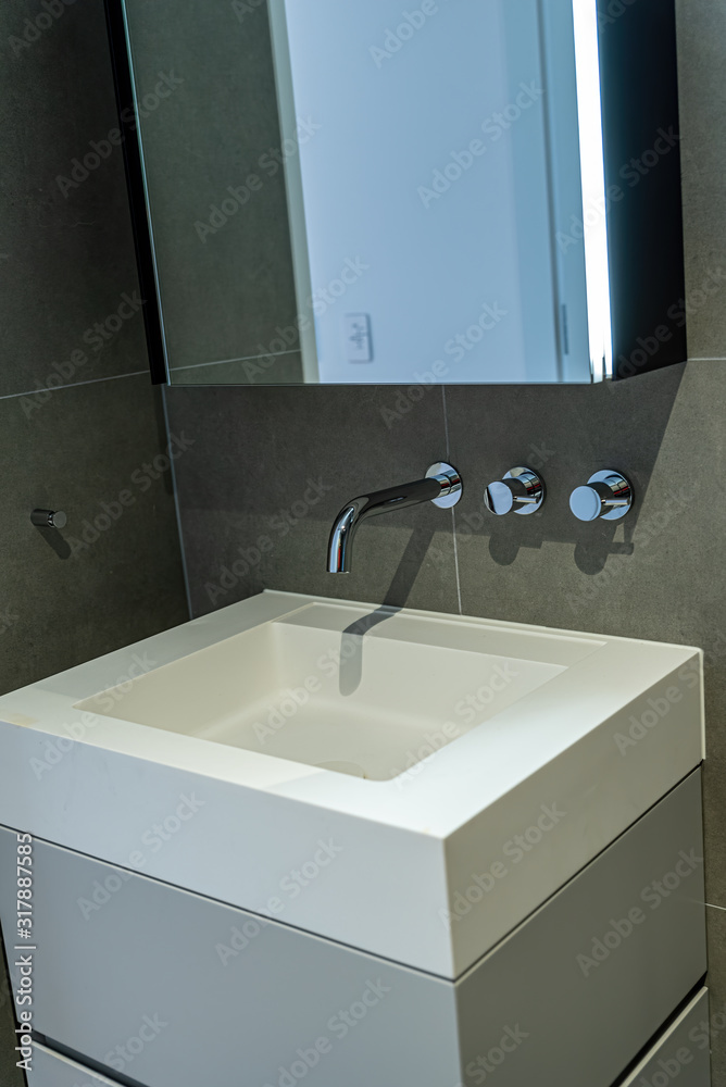 Fototapeta premium new trendy bathroom sink in an apartment building