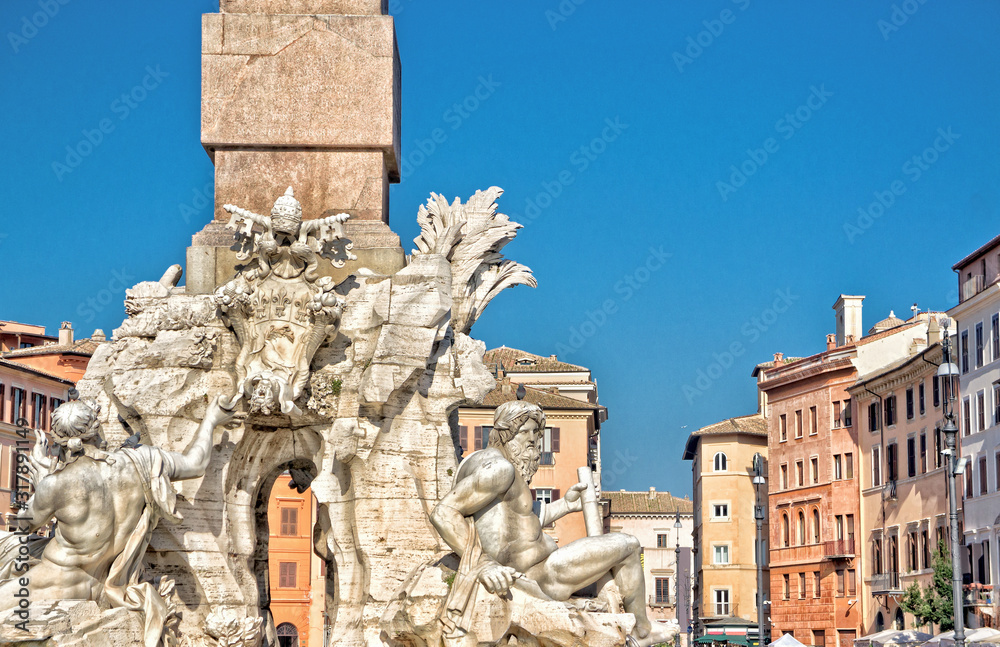 The Fountain of the four rivers in the middle of Piazza Navona - Rome Italy