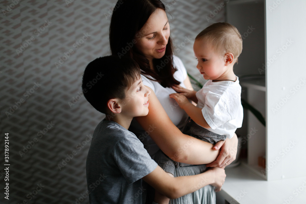 mother with two children,love and embrace family mother with two children,love and embrace family