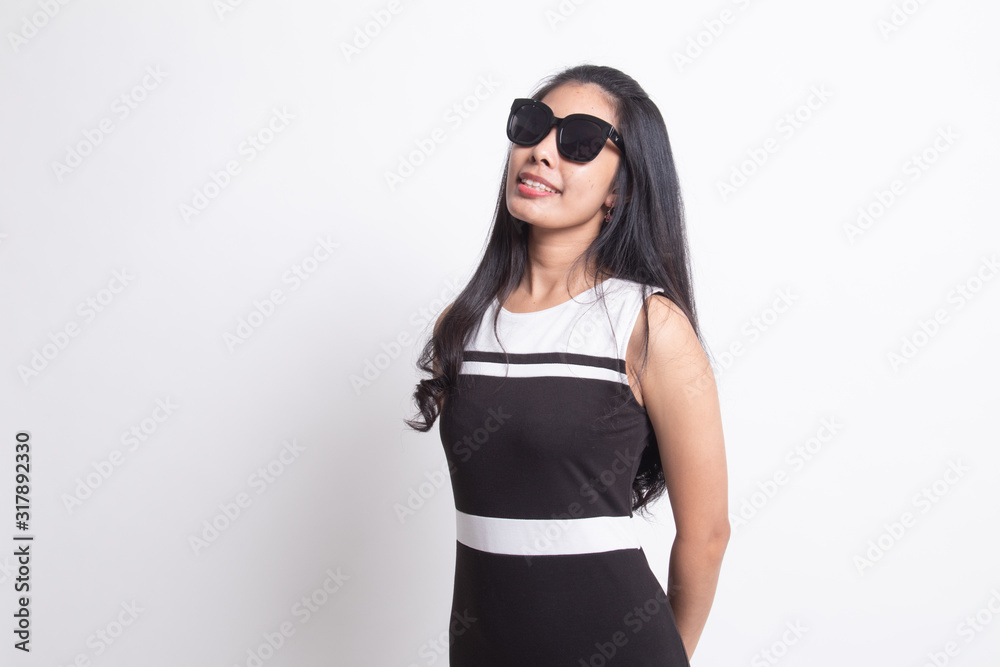 Portrait of a beautiful young asian girl in sunglasses. Portrait of a beautiful young asian girl in sunglasses.