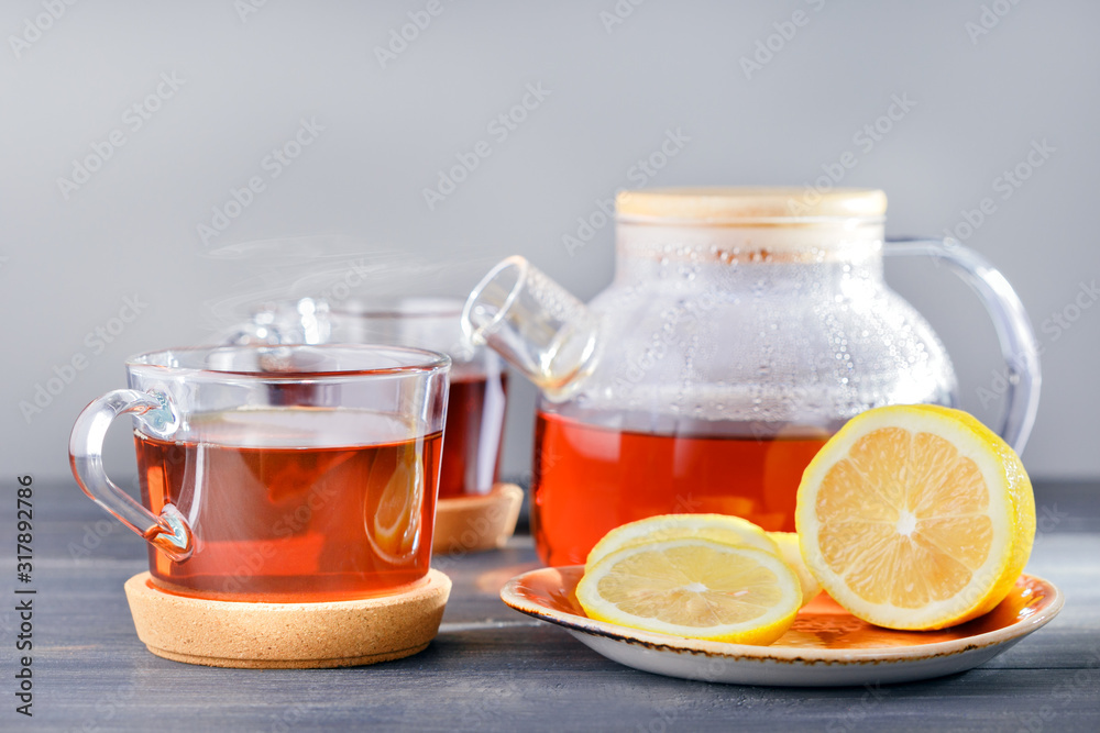 Time for tea, tea cups, teapot with hot tea and lemon on table. Time for tea, tea cups, teapot with hot tea and lemon on table.