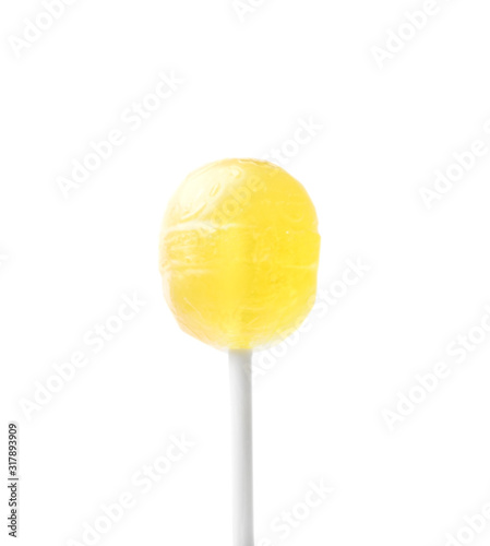 Tasty lemon flavored lollipop isolated on white