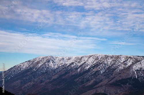 Snow-capped mountain peak and effective clouds. © Ali Tellioglu