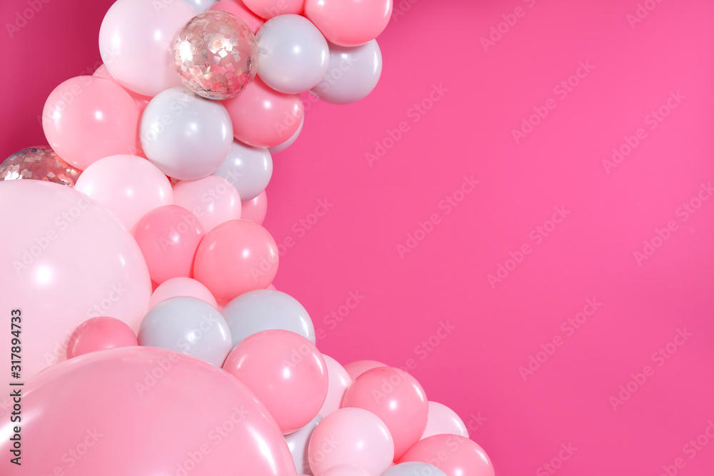 Beautiful composition with balloons on pink background. Space for text