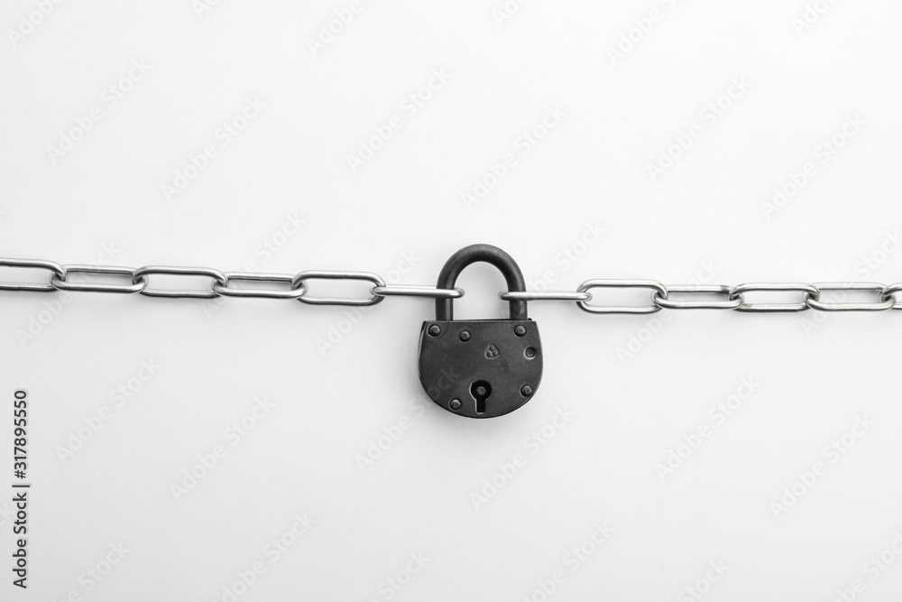 Steel padlock and chain isolated on white, top view. Safety concept Steel padlock and chain isolated on white, top view. Safety concept