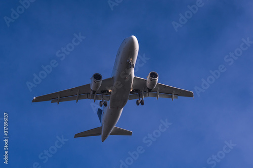 Close view to landing passenger jet