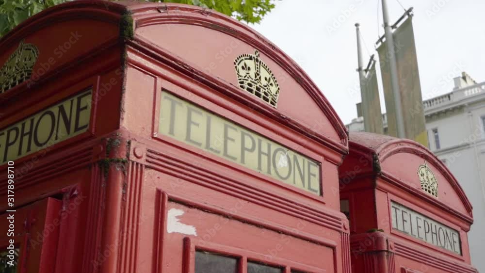 Close up of Iconic London Red Telephone Boxes, traditional British spots, England, United Kingdom. Close up of Iconic London Red Telephone Boxes, traditional British spots, England, United Kingdom.