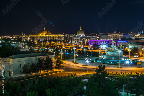 Night view of the presidential palace (Oguzhan) in Ashgabat Turkmenistan photo