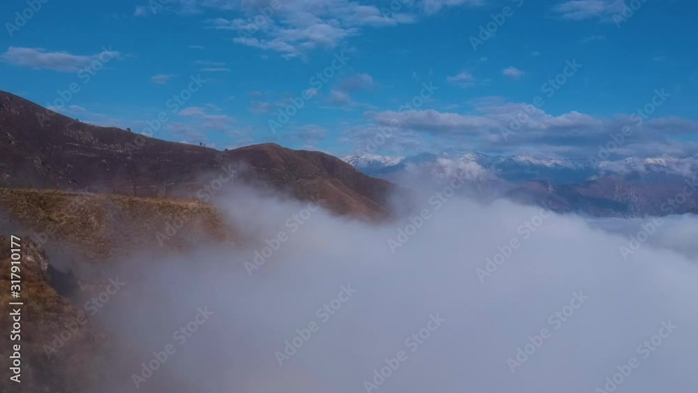 Colca Canyon Landscape With Fog. Aerial Ascending View Colca Canyon Landscape With Fog. Aerial Ascending View