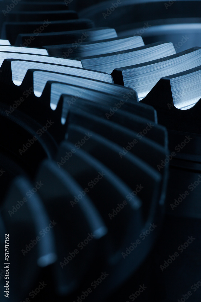 Close-up of cock wheels with blue light