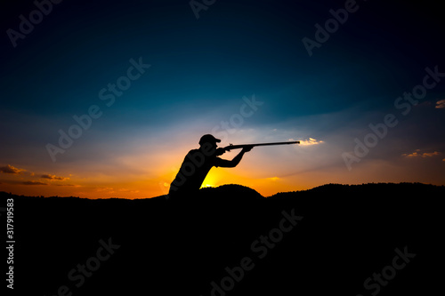 Hunters and rifle silhouette women © blackdiamond67