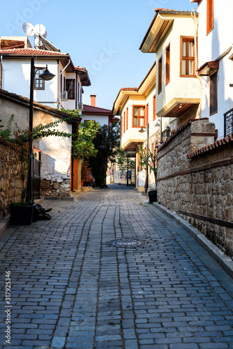 Antalya, Turkey - July 26, 2019: Street in the Historic part of Antalya Kaleici, Turkey. Old town of Antalya is a popular destination among tourists