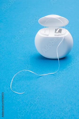 dental floss on a colored background