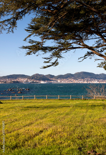 View of Vigo estuary and Cangas do Morrazo village from the park of Carril beach photo