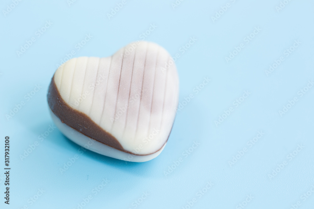 chocolate heart shape Valentine's day on blue background for texture chocolate heart shape Valentine's day on blue background for texture