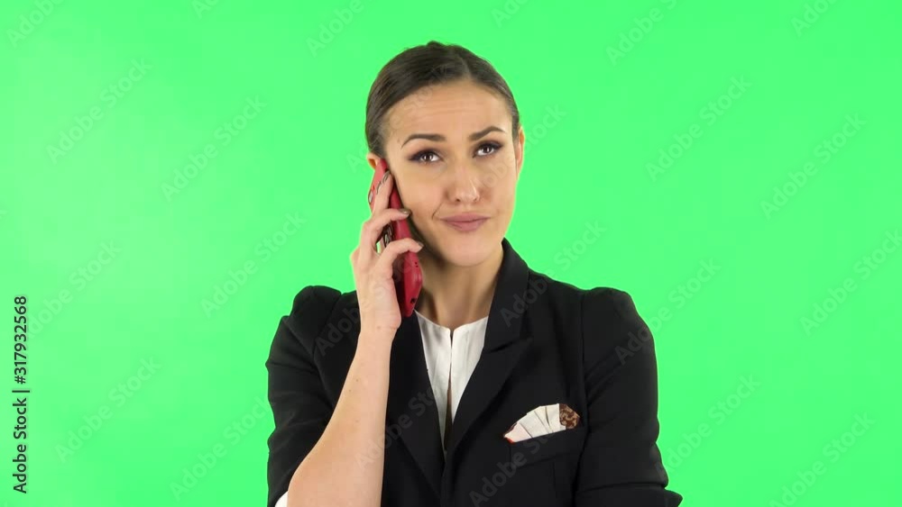 Girl angrily speaks on the phone, proves something. Green screen Girl angrily speaks on the phone, proves something. Green screen